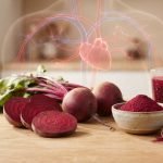 Fresh beets and beetroot powder with abstract blood flow and oxygen delivery background